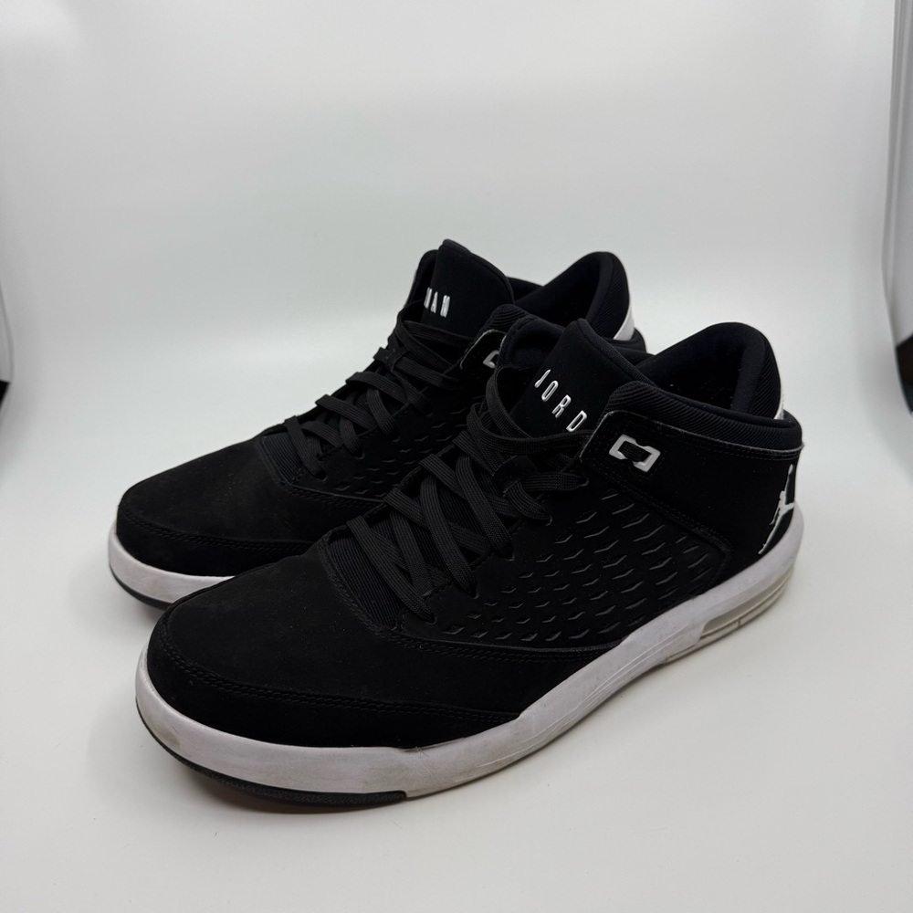 Jordan Black and White Mid-Top Sneakers